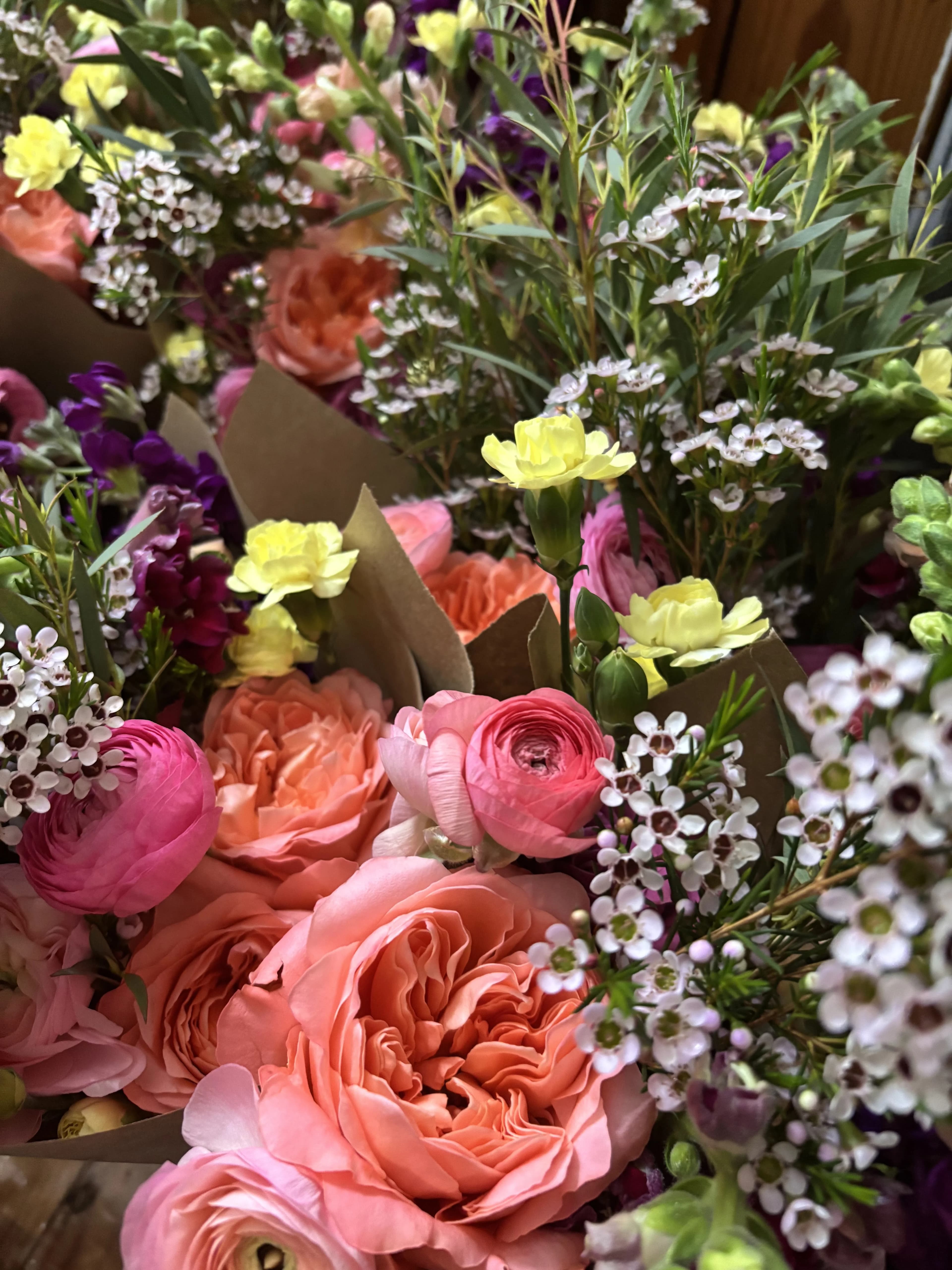 Ranunculus and roses close-up
