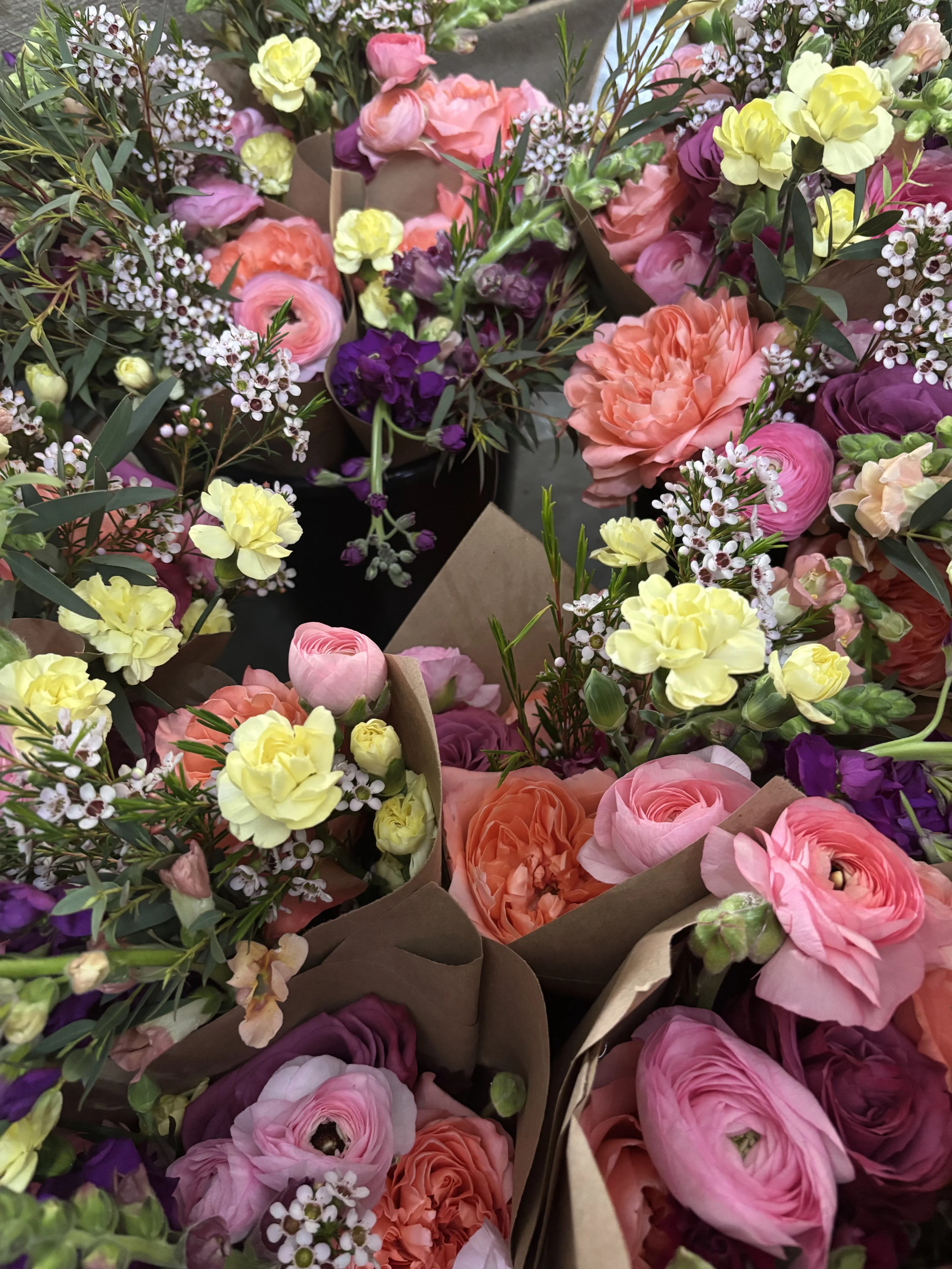 Fresh market bouquets in kraft paper